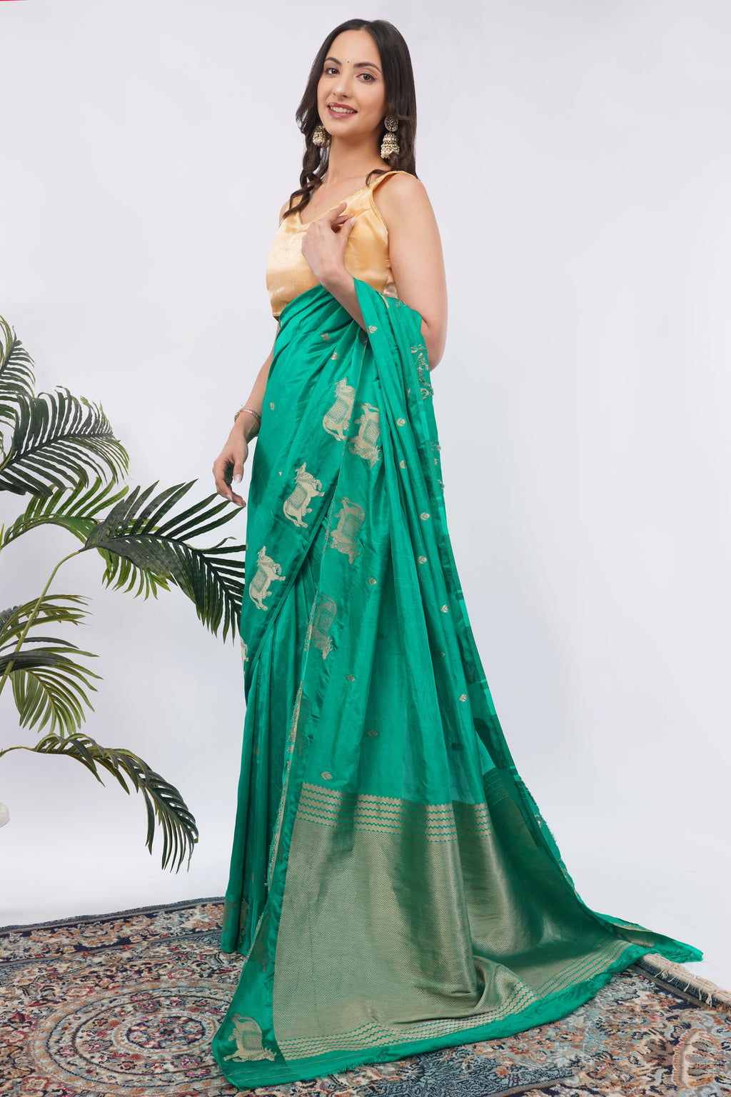 Tulip Handloom Emerald Green Silk Saree with Gold Zari Cow Motifs
