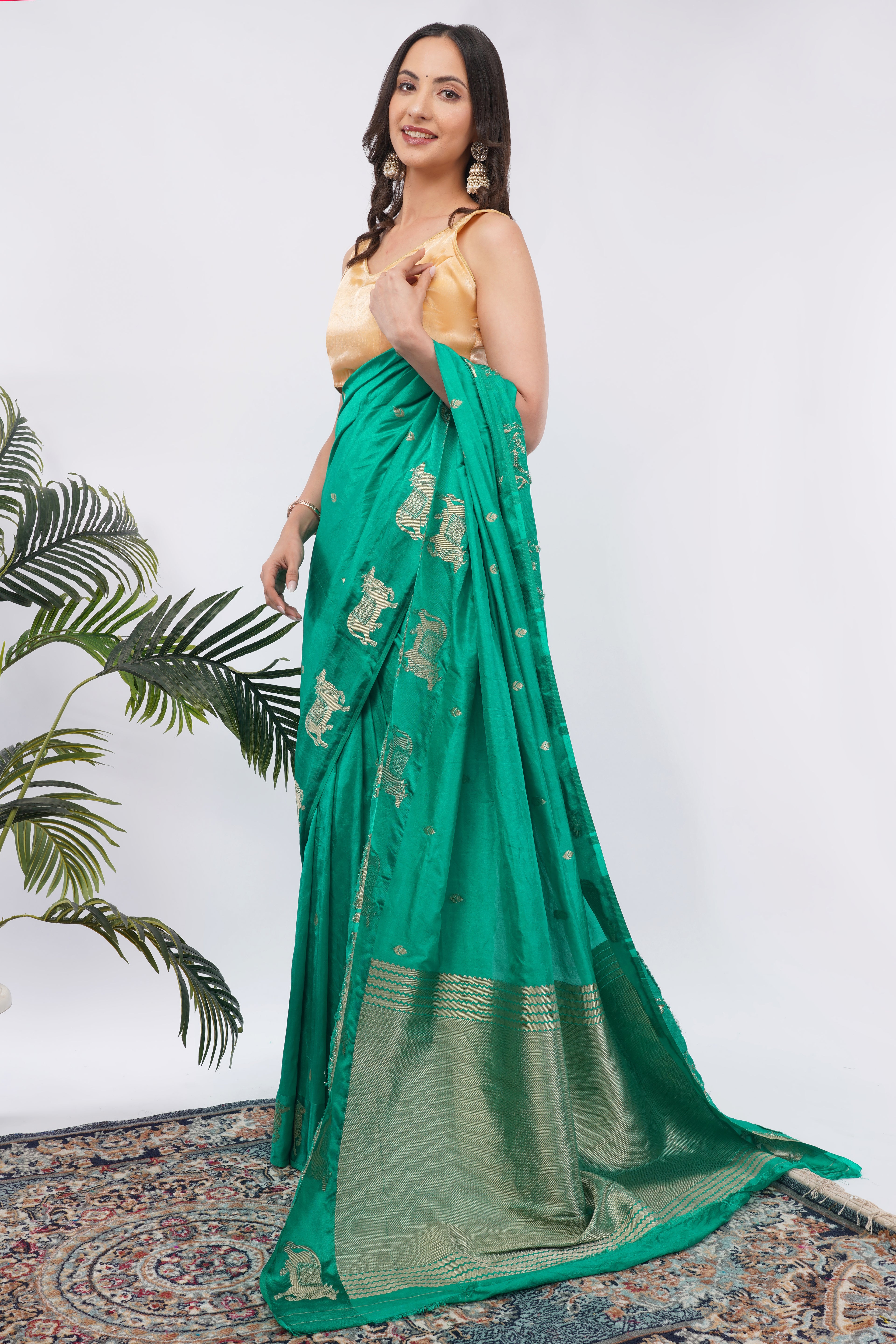 Tulip Handloom Emerald Green Silk Saree with Gold Zari Cow Motifs