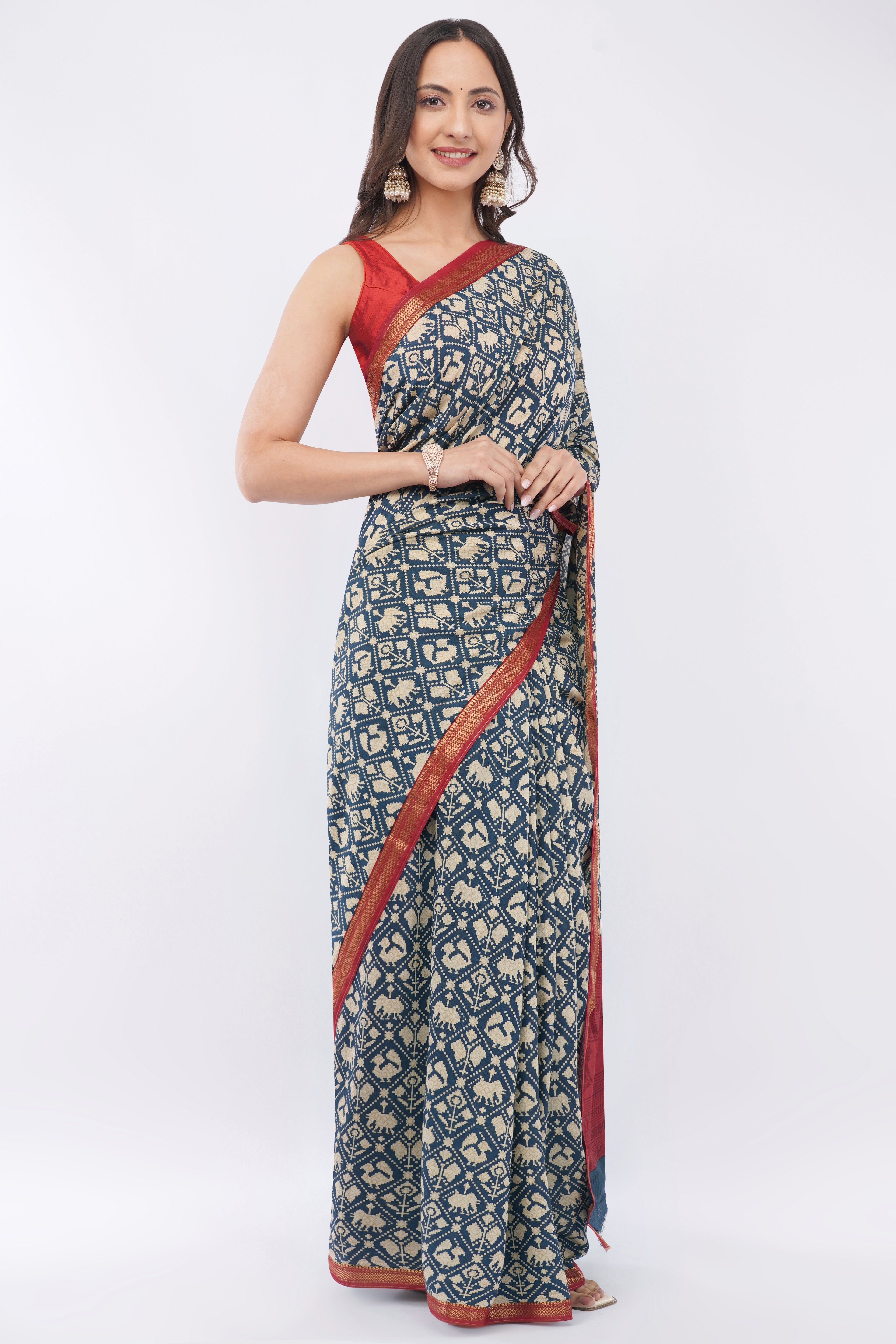 Exquisite Navy Blue Suvin Cotton Saree with Traditional Patola Prints & Maroon Border
